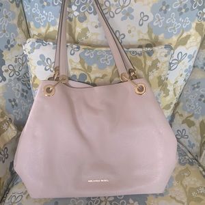 Michael Kors Light pink bag with gold hardware.